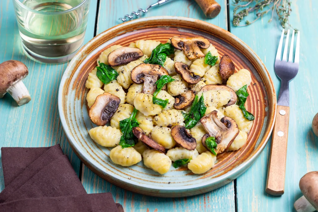 gnocchi creamy sauce with mushrooms spinach healthy eating vegetarian food scaled