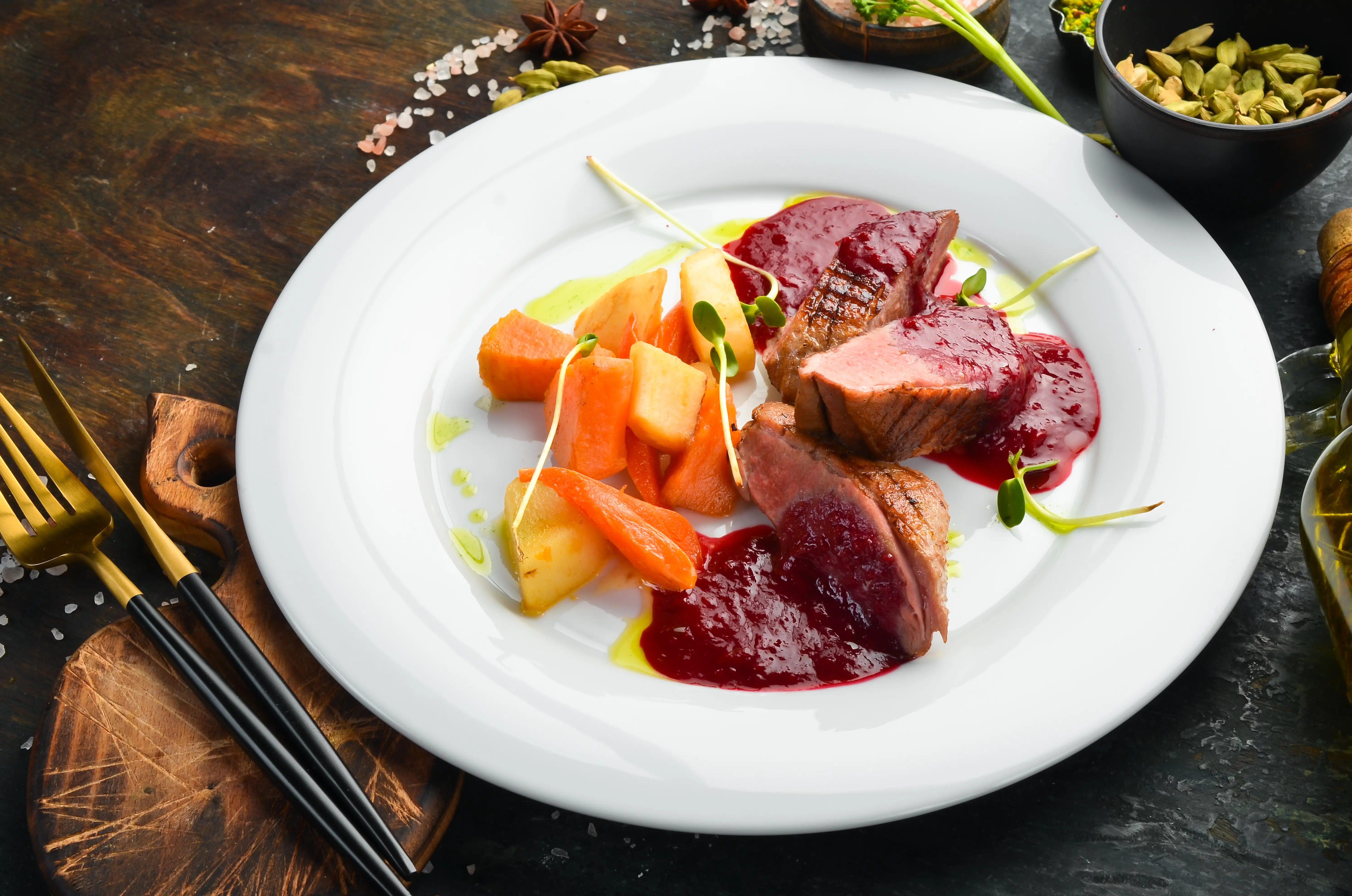 baked-duck-breast-with-celery-root-vegetables-white-plate-top-view-rustic-style